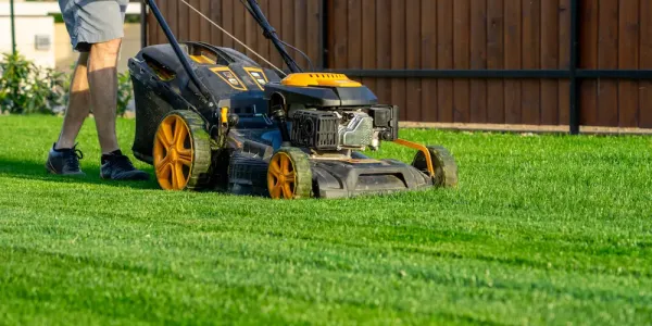 man mowing lawn